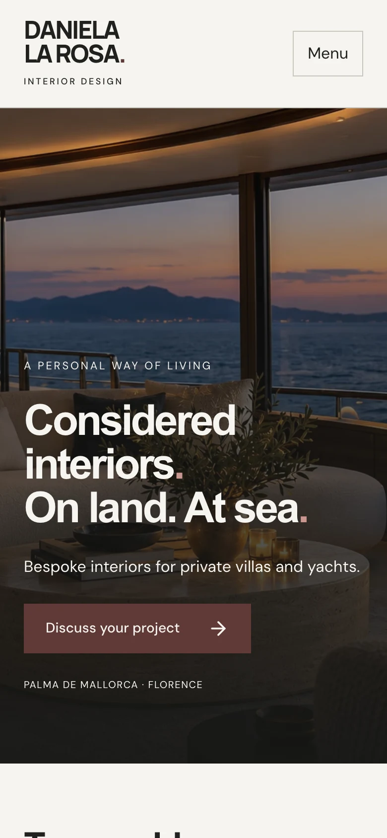 Mobile homepage with readable headline, menu and project enquiry button